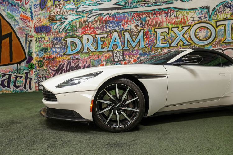 Close-up side view of white Aston Martin DB11 V12