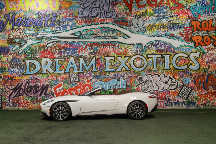 Side profile of white Aston Martin DB11 V12 at Dream Exotics