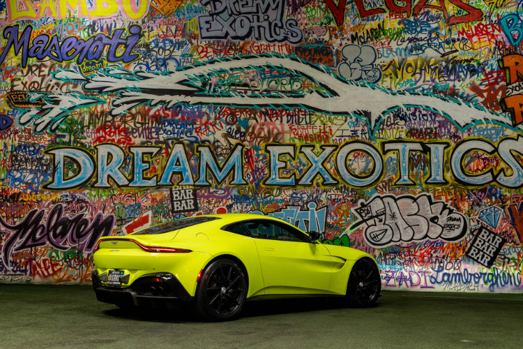 Neon green Aston Martin Vantage luxury sports car rental in Los Angeles from Dream Exotics.