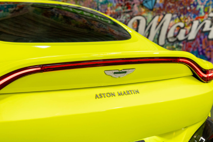 Neon green Aston Martin Vantage luxury sports car rental in Los Angeles from Dream Exotics.