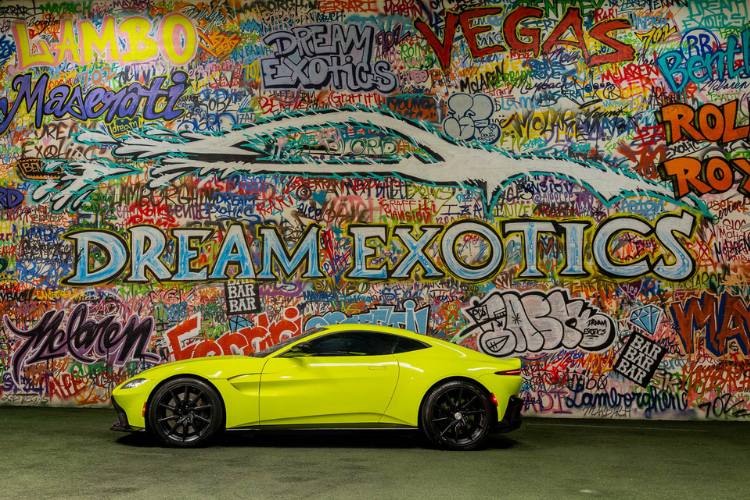 Neon green Aston Martin Vantage luxury sports car rental in Los Angeles from Dream Exotics.