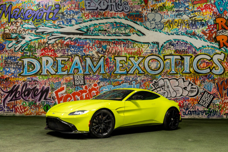 Neon green Aston Martin Vantage luxury sports car rental in Los Angeles from Dream Exotics.