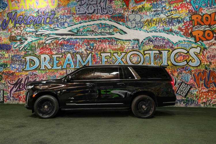 Side profile of black Cadillac Escalade ESV