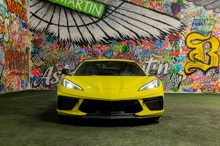Yellow Chevrolet Corvette C8 sports car rental in Los Angeles from Dream Exotics.