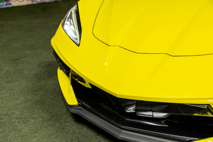 Yellow Chevrolet Corvette C8 sports car rental in Los Angeles from Dream Exotics.