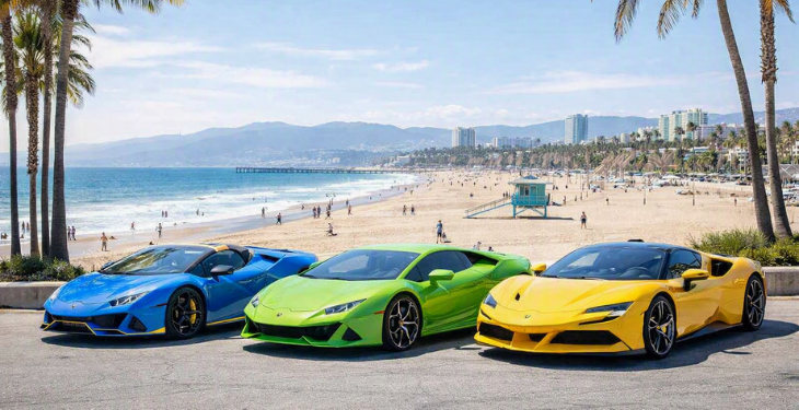 Dream Exotics Los Angeles location with three luxury cars on a beach.