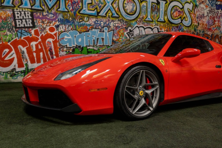 Front close-up of red Ferrari 488 Spider rental at Dream Exotics