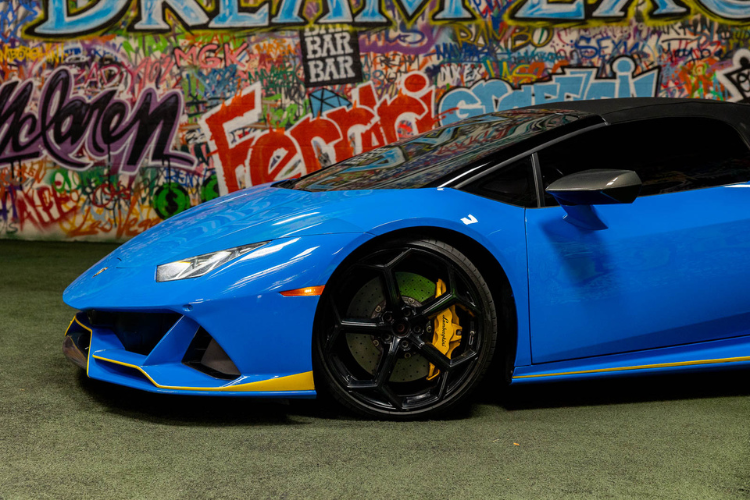 Blue Lamborghini Huracán EVO Spyder convertible rental in Los Angeles from Dream Exotics.