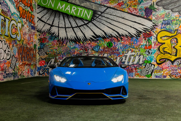 Blue Lamborghini Huracán EVO Spyder convertible rental in Los Angeles from Dream Exotics.