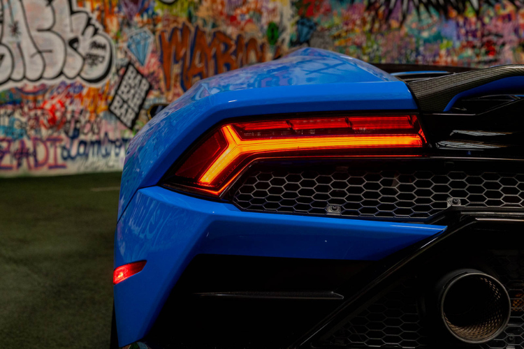 Blue Lamborghini Huracán EVO Spyder convertible rental in Los Angeles from Dream Exotics.