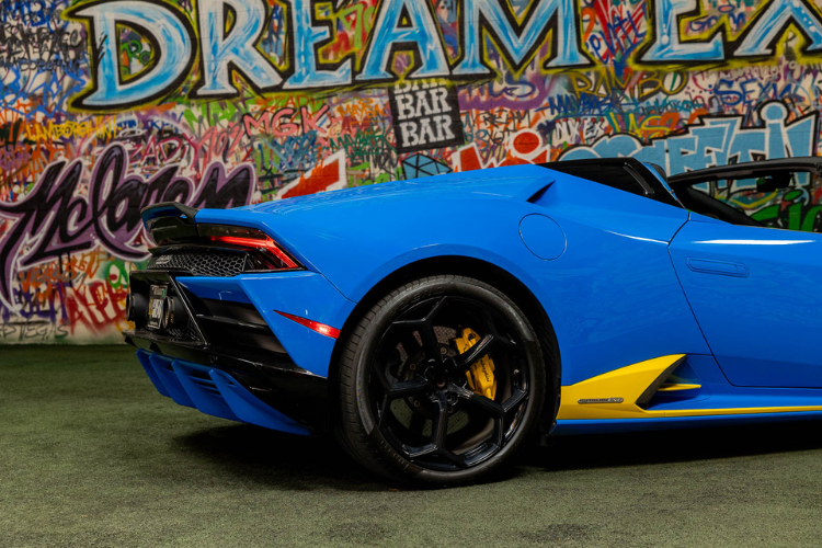 Blue Lamborghini Huracán EVO Spyder convertible rental in Los Angeles from Dream Exotics.