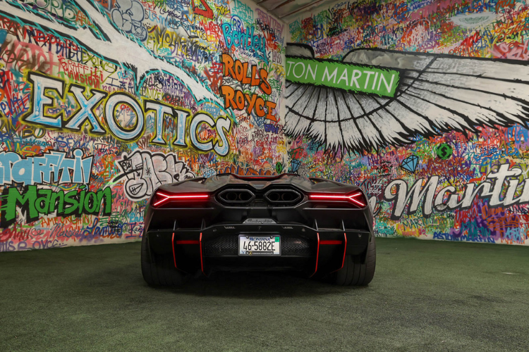 Rear view of black Lamborghini Revuelto at Dream Exotics