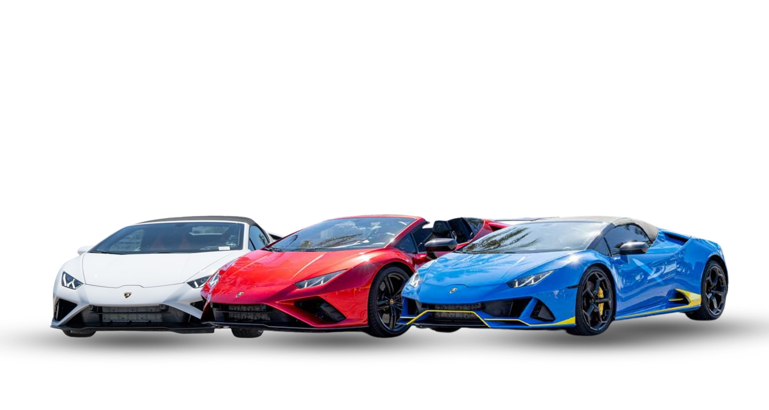Dream Exotics lineup of three Lamborghini sports cars in Las Vegas, featuring white, red, and blue vehicles positioned side by side against a white background.