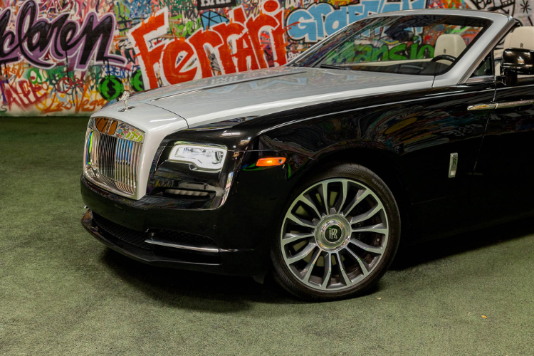 Black and silver Rolls-Royce Dawn convertible rental in Los Angeles from Dream Exotics.